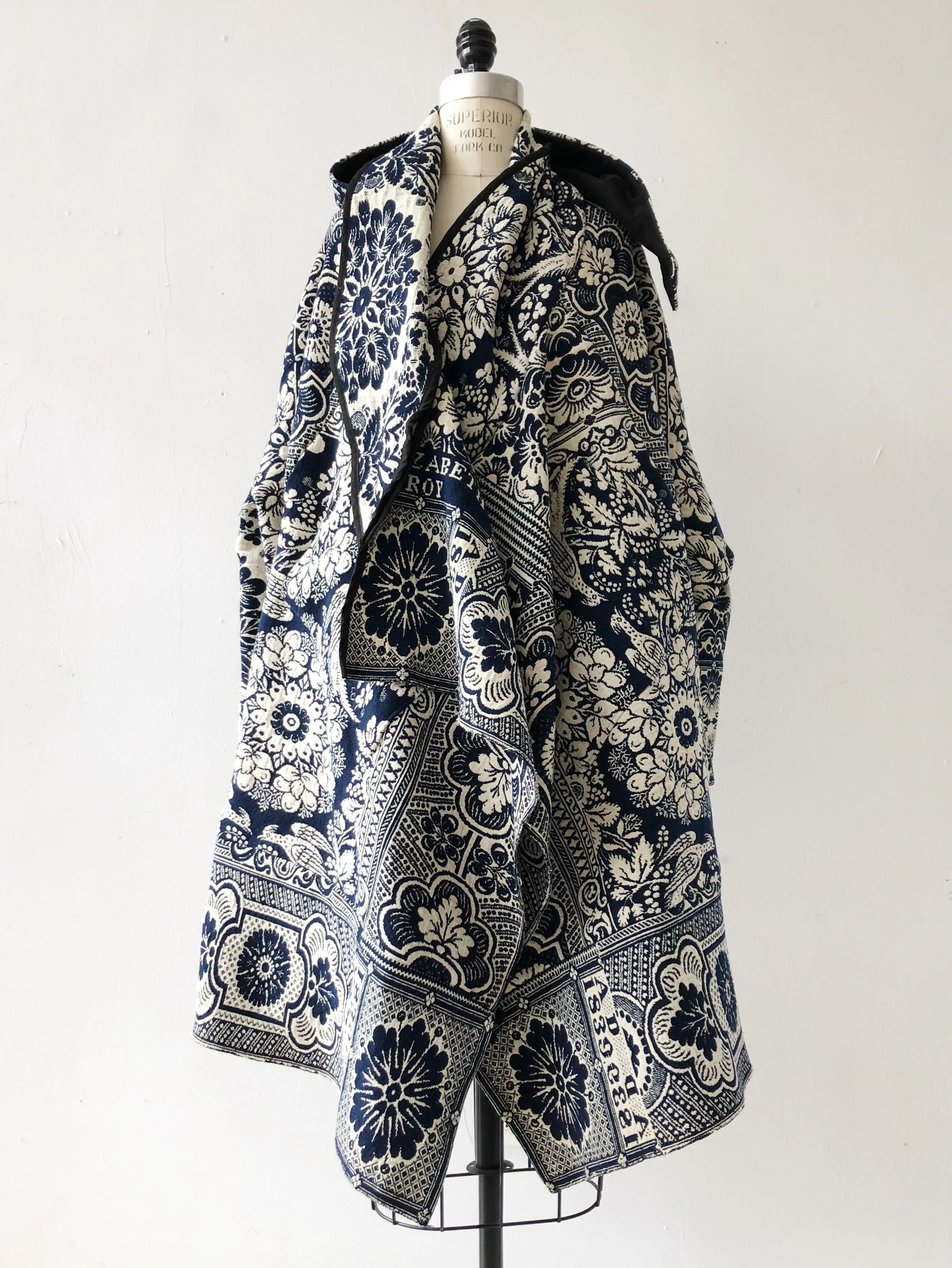 1839 coverlet cocoon with hood