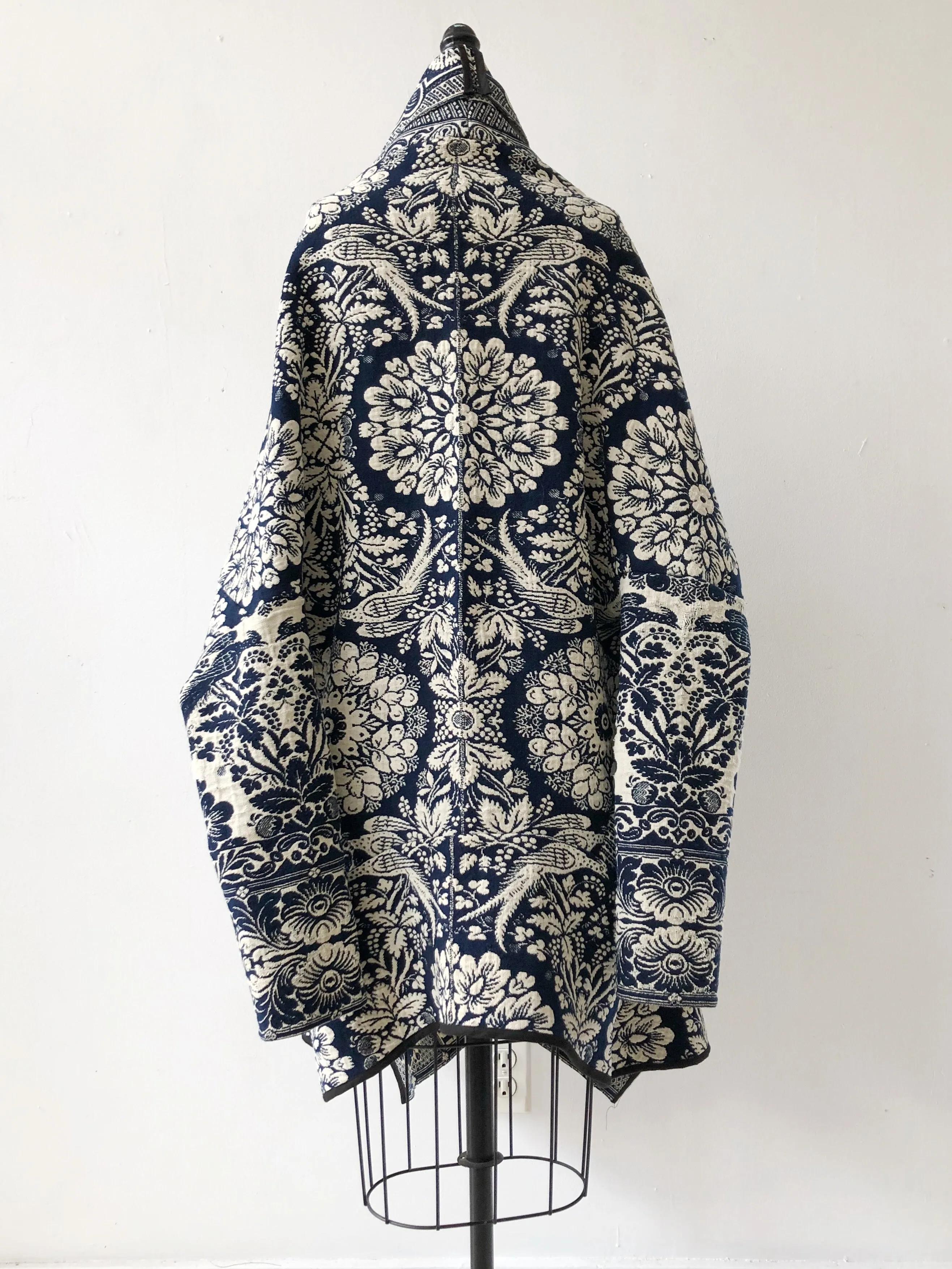 1839 coverlet cocoon with hood