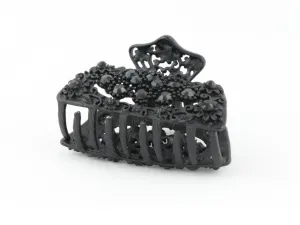 Black metal hair claw clip with black stones on a tiny floral pattern