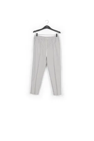 Grey and off-white checked cotton-blend pants