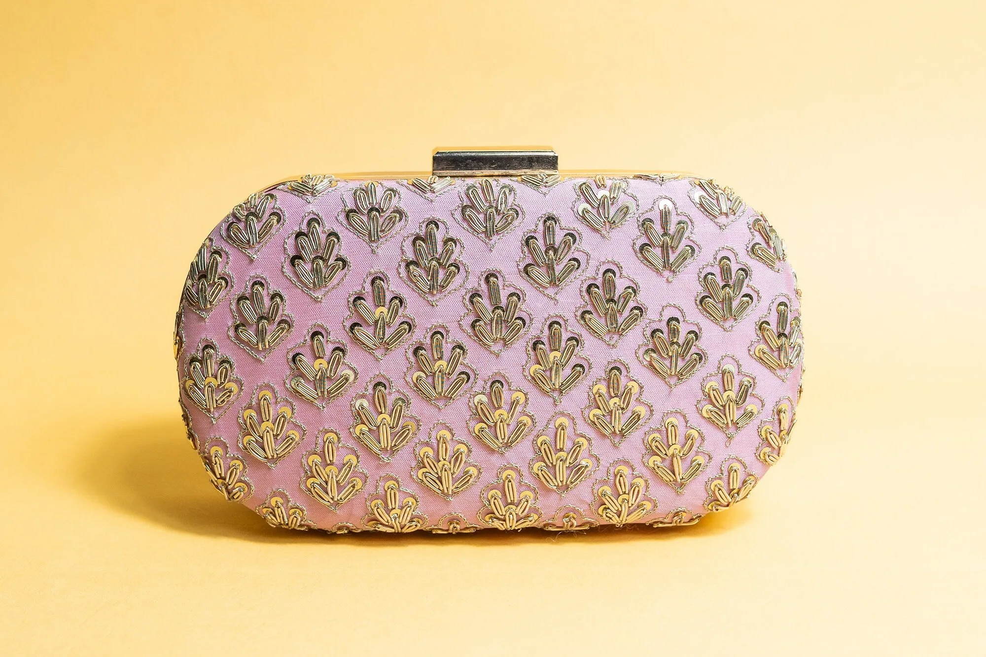 Pink metal embroidery clutch bag with detachable sling