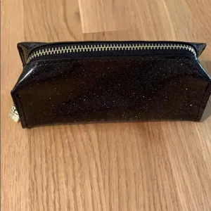 Yves Saint Laurent Mini Pouch - Black